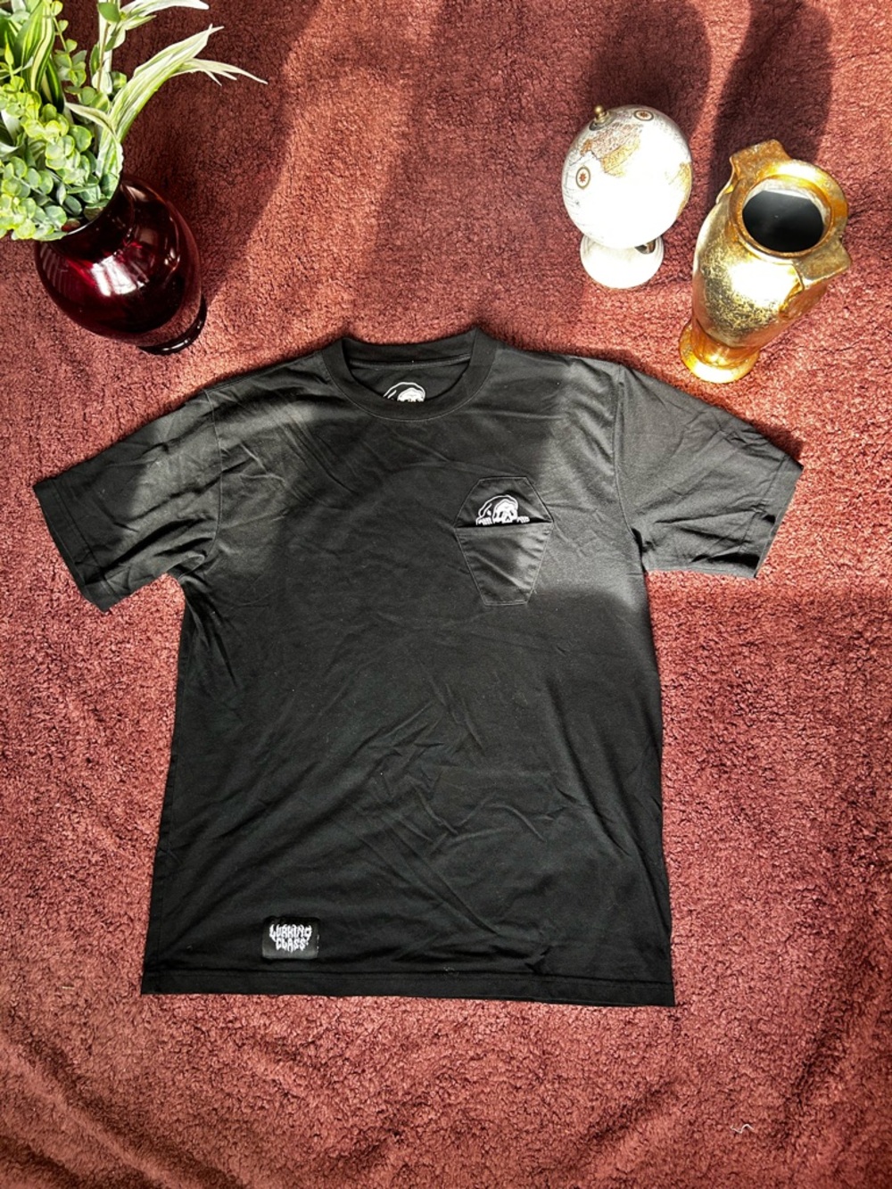 Men's Black Short-Sleeve Pocket Tee with Subtle Graphic